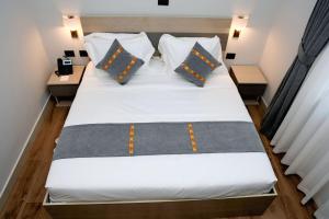 Giường trong phòng chung tại Haile Hotel shashemene