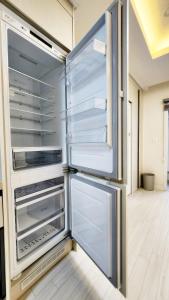 Кровать или кровати в номере 미소 하우스, 대전시청역 도보2분 둔산동 번화가 신축