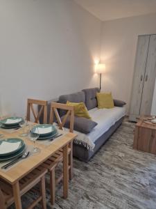 Ένα ή περισσότερα κρεβάτια σε δωμάτιο στο Divčibare apartman Doros