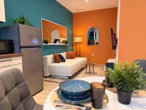 TV a/nebo společenská místnost v ubytování Cocon Terracotta - Netflix et Parking