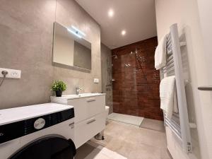 Koupelna v ubytování Cocon Terracotta - Netflix et Parking + 21 fotografií