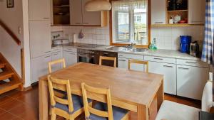 Kuchyň nebo kuchyňský kout v ubytování Ferienhaus Zaunkönig + 11 fotografií