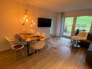 TV a/nebo společenská místnost v ubytování "Schneerosenblüte", Oberstaufen-Steibis