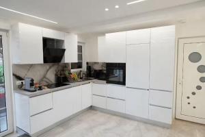 Η κουζίνα ή μικρή κουζίνα στο Les suites du lion +33 φωτογραφίες