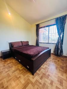 Ένα ή περισσότερα κρεβάτια σε δωμάτιο στο Green view villa