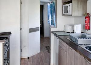 Kuchyň nebo kuchyňský kout v ubytování Anchor Park