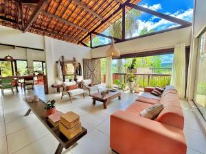 Χώρος καθιστικού στο Vila Bambu – by Refúgio Hospedagens