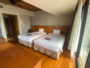 Postel nebo postele na pokoji v ubytování PROSTYLE TERRACE NAHA + 91 fotografií