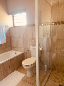 Ένα μπάνιο στο Andela Guesthouse