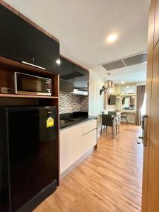 Η κουζίνα ή μικρή κουζίνα στο Centrally located cozy Studio