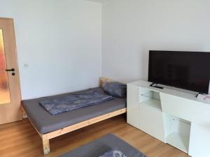 Μια τηλεόραση ή/και κέντρο ψυχαγωγίας στο City Apartment