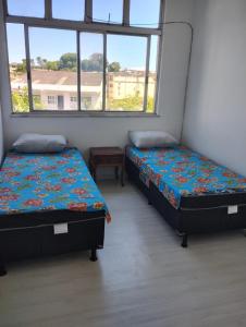 Voodi või voodid majutusasutuse Pousada Nery toas