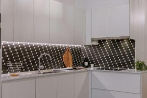 Kuchyň nebo kuchyňský kout v ubytování Huswell - Cosy apartment in the centre of Knokke