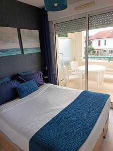 Ένα ή περισσότερα κρεβάτια σε δωμάτιο στο Appartement Ciboure golf et Nivel