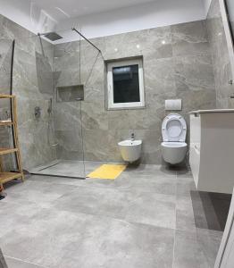 Ένα μπάνιο στο Ferienhaus Qelia