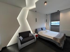 Postel nebo postele na pokoji v ubytování Hotel Orion Chełmiec koło Nowego Sącza + 56 fotografií