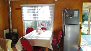 Kuchyň nebo kuchyňský kout v ubytování Cabañas el Remanso