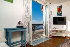 TV a/nebo společenská místnost v ubytování Apartment Julietta