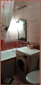 Et badeværelse på Квартира 2х-комнатная посуточно