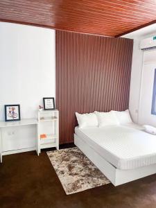 Кровать или кровати в номере Modern One Bedroom Apartment Near Ecowas Asokoro