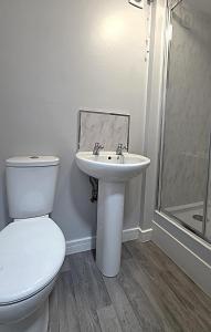 Koupelna v ubytování Central Guest House