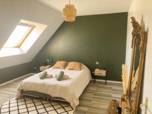 Кровать или кровати в номере Maison lumineuse, proche plage et nature