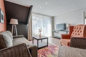 TV a/nebo společenská místnost v ubytování Badhotel Bruin