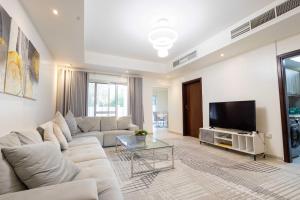 Et tv og/eller underholdning på Malibu Luxe I Priavte Pool I 5 bed Villa