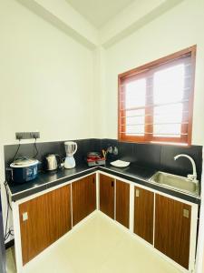 Kuchyň nebo kuchyňský kout v ubytování Sanu Surfing Villa