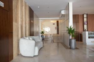 Posezení v ubytování فندق رويال اديشن للشقق الفندقية