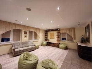 Χώρος καθιστικού στο Brīvdienu māja Lielzemenes