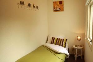 Postel nebo postele na pokoji v ubytování Hello Zeeland - Molenweg 26