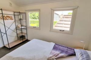 Postel nebo postele na pokoji v ubytování Hello Zeeland - Molenweg 26 + 3 fotografie