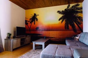 TV a/nebo společenská místnost v ubytování Logies 't Eenvoud - Simple Rooms - Stilte, Rust & Herbronning aan Zee