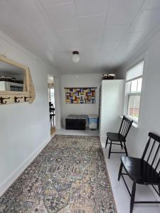 Posezení v ubytování Seaside Serendipity Cottage + 31 fotografií