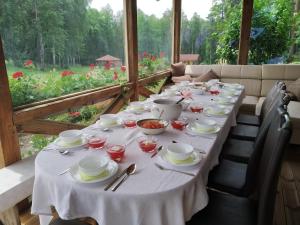 Κήπος έξω από το Brīvdienu māja Lielzemenes