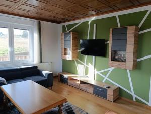 TV a/nebo společenská místnost v ubytování Casa del Witzmann