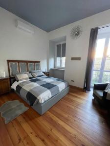 Giường trong phòng chung tại La Reggia di Famiglia