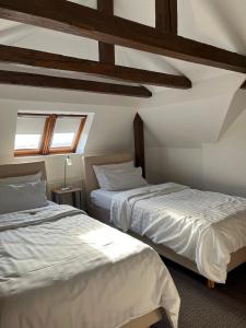 Postel nebo postele na pokoji v ubytování Hotel Alt-Connewitz + 119 fotografií