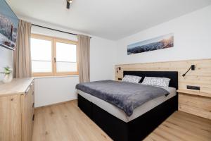 Ένα ή περισσότερα κρεβάτια σε δωμάτιο στο Ferienwohnung Persal