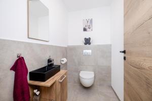 Ένα μπάνιο στο Ferienwohnung Persal +17 φωτογραφίες