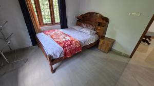 Ένα ή περισσότερα κρεβάτια σε δωμάτιο στο River Mist