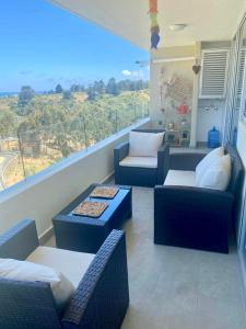 Χώρος καθιστικού στο Acogedor Lindo Dpto Los Castaños, Algarrobo Norte, Piscinas Jacuzzi Gym, Wifi Home Office