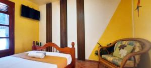 Ένα ή περισσότερα κρεβάτια σε δωμάτιο στο Maison avec Jardin et salle de sport