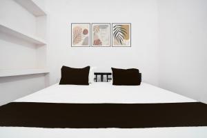 Ένα ή περισσότερα κρεβάτια σε δωμάτιο στο THE HOTEL PARADISE +21 φωτογραφίες