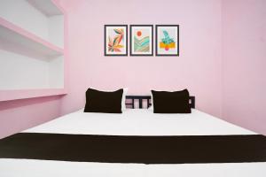 Ένα ή περισσότερα κρεβάτια σε δωμάτιο στο THE HOTEL PARADISE