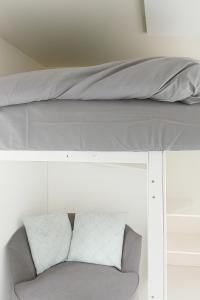 Postel nebo postele na pokoji v ubytování Tiny Cosy Home