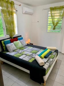 Postel nebo postele na pokoji v ubytování Le coin vertico