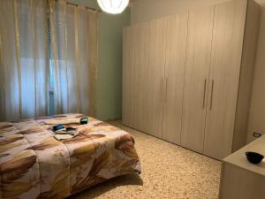 Giường trong phòng chung tại La Casa del Corso