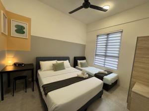 Ένα ή περισσότερα κρεβάτια σε δωμάτιο στο Simple Stay Aston Acacia Bukit Mertajam +29 φωτογραφίες